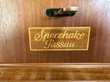 a wooden door with a sign on it that says sherbershake passau