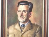 painting of a man in a military uniform in a brown frame