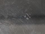 close up of a metal pan with a lot of scratches on it