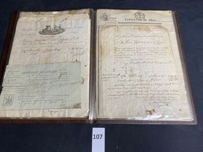 an old document with writing on it sitting on top of a table