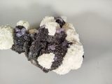 a close up of a piece of food on a white plate