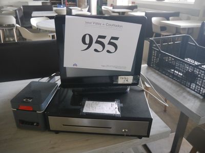 a laptop sitting on top of a table with a price sign on it