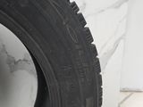 a close up of a tire on a marble floor