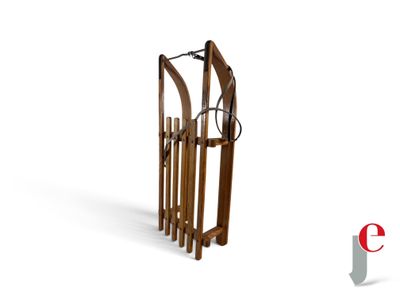 a wooden sled with a handle and a handle on a white background
