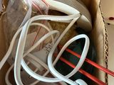 a cardboard box with a bunch of wires in it