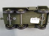 a toy train with wheels and a sign on the side