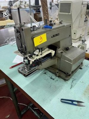 a sewing machine that is sitting on a table