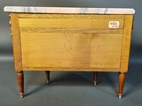 an old wooden chest with marble top and legs