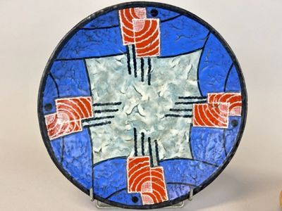 Grande coupe Art Déco en céramique à décor géométrique.