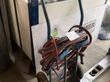 a cart with a bunch of wires attached to it