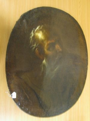 un tableau représentant un homme barbu accroché au mur