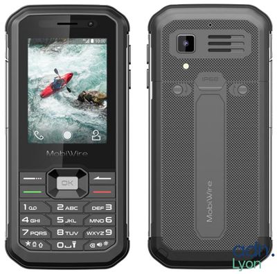 a black cell phone sitting on top of a white surface