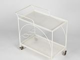 an image of a white serving cart on wheels