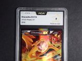 an image of a pokemon card in a plastic case