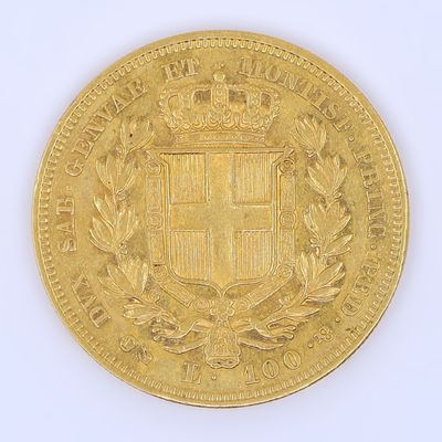 l'image d'une pièce d'or sur laquelle figurent des armoiries
