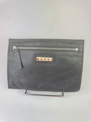 a black leather clutch bag with a zipper on the front