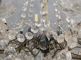 a chandelier that has a bunch of crystal beads hanging from it