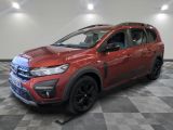 a red 2020 toyota rav is shown in a showroom