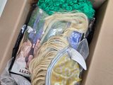 a cardboard box with a bunch of hair in it