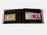 a black wallet with two different bills inside of it