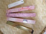 three different types of mascaras on a bamboo mat
