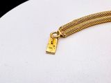 a close up of a gold chain with a padlock on it