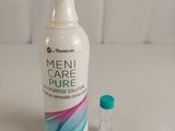 a bottle of menil care pure next to a small bottle of menil