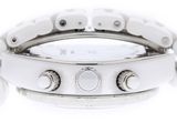 an image of a close up of a wrist watch on a white surface