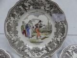 a plate with a picture of a man and a woman on it