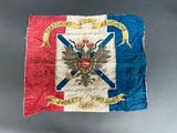 an old flag with a coat of arms and a crown on it
