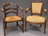 a pair of early 20th century oak and cane back chairs