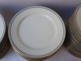 a lot of plates that are stacked on top of each other