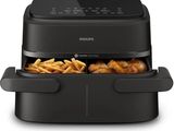 friteuse à air chaud Philips contenant des frites