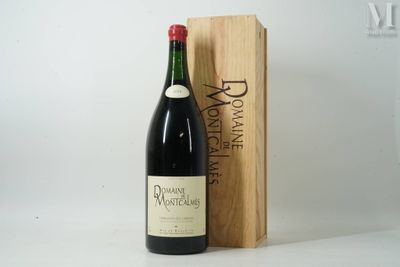 a bottle of wine in front of a wooden box
