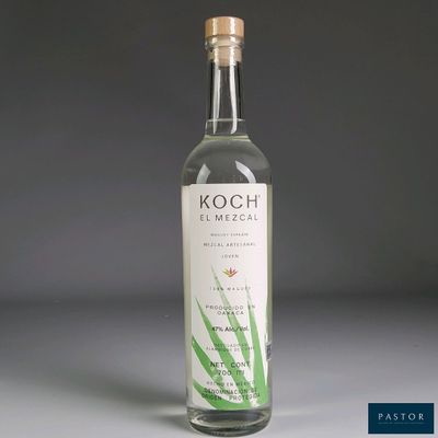 a bottle of alcohol that is sitting on a table