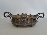 an image of a metal bowl with a decorative design on it