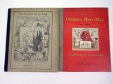 Deux livres sont posés sur une surface blanche : l'un est rouge et l'autre est noir.