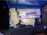 a blue box with a lot of items inside of it