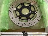 a box with a motorcycle disc in it on a table