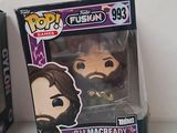 funko pop vinyl figures are displayed in a box on a white surface