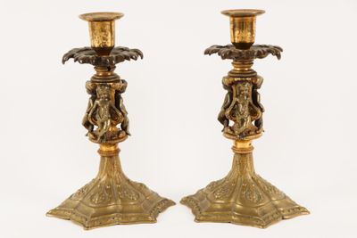 pair of antique brass candlesticks with angels and cherenshes