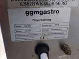 a close up of a machine with a hose attached to it