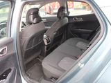 the back seats of a car are empty in the parking lot