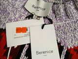 two tags on a sweater that say berenice on them