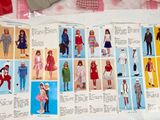 a bunch of dolls that are on a table