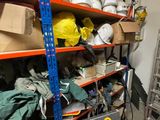 many shelves with various items on them in a room