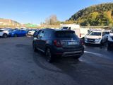 the car is parked in the parking lot with other cars