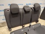four seats in the front row of a car