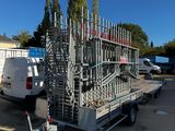 an image of a trailer with a bunch of pipes attached to it