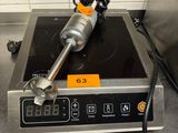 une image représentant une cuisinière sur laquelle se trouve une plaque de cuisson